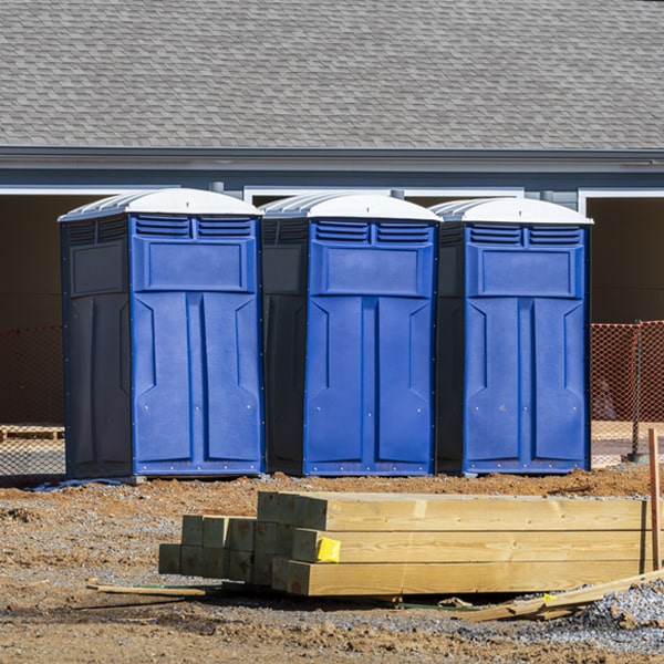 how often are the portable restrooms cleaned and serviced during a rental period in Jay Em